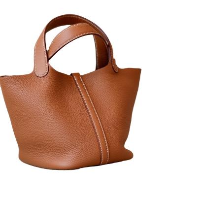 China Fashion Family Mini Bag Bucket Basket Large Capacity Slotted Handbag Full Vegetable Manual Line Portable Wax Women's Bag for sale