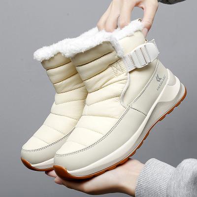 China CUSHIONING men's waterproof Anti-slippery hot sale winter furry warm wholesale fashion women snow boots couple snow shoes for sale