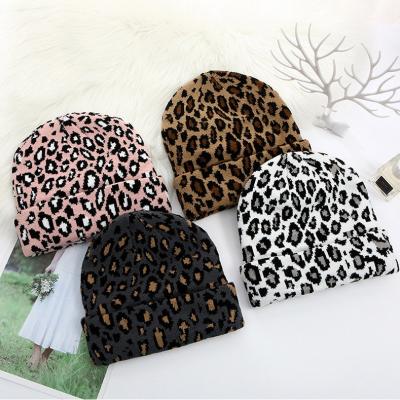 China Wholesale Hot Sale Character Soft Print Beanie Pom Pom Hat Winter New Cute And Warm Leopard Knitted Hats for sale