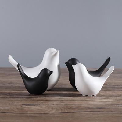 China Europe Ceramic Black And White Small Size Indoor And Outdoor Low MOQ Bird Home Decoration for sale