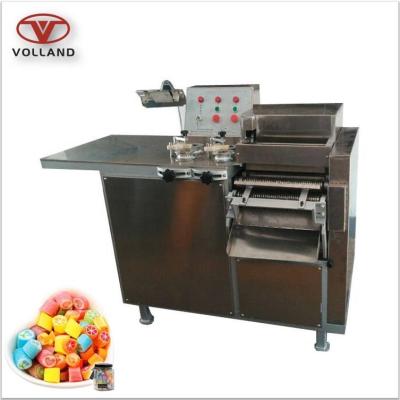 China High efficiency flat logo lollipop cutter machine/embossed sugar candy cutting machine /hard candy slicing machine for sale