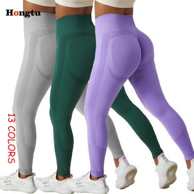 China Hot Selling 13 Breathable Colors Running Outdoor Hip Lift Fitness Yoga Pants Women High Waist Sports Seamless Knitted Breathable Yoga Gaiters for sale