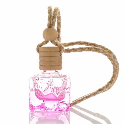 China Aromatherapy Empty Hanging Bottle Cosmetic Car Glass Bottle Perfume Diffuser Bottle Air Ornament Refillable Hanging Cooler Vials for sale