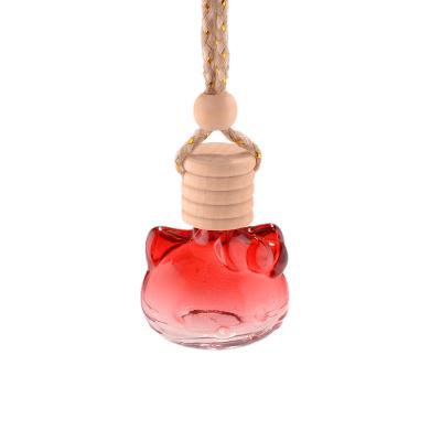 China Car Cosmetic Empty Mini Matte Frosted Color Car Hanging Air Freshener Glass Perfume Diffuser Bottle With Wooden Cap for sale