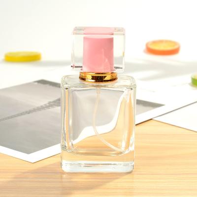 China 30ml 50ml 100ml polygon spray cosmetic perfume bottle, transparent cosmetic glass bottle for sale