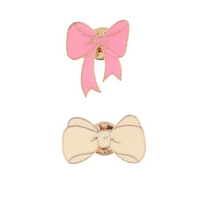 China Handsome cartoon fashion bow tie, metal brooch, girl pink cartoon, cute badge, men and women's clothing, bag, decorative buckle for sale