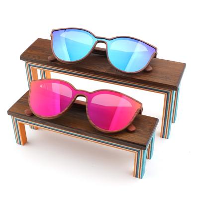 China 2022 Sample Display Sunglasses New Colorful Eyewear Skateboard Bamboo Wood Customized Logo Display Stand for sale