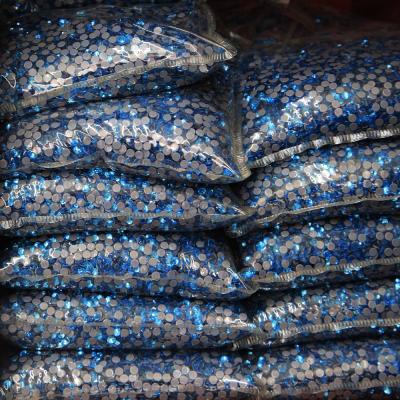 China Hot 100 Hot Blue Green Wholesale Bulk Flatback Yantuo Package Rough Rhinestone Iron On Back Flat Rhinestone Glass Rhinestones for sale