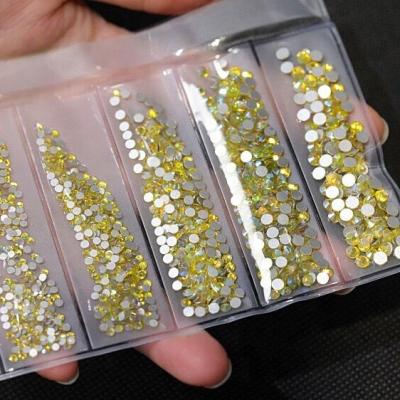 China Wholesale yantuo eco-friendly dories yellow citrine mixed 6 sizes SS4-SS12 3D Nail Art Decoration Glass Rhinestone for sale