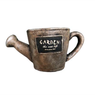 China Modern Watering Can Shaped Rustic Concrete Pottery Planter For Indoor Plants Seed Planters for sale