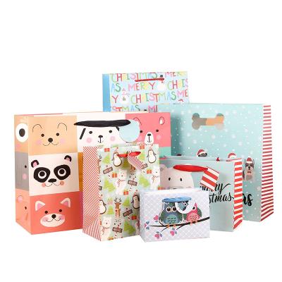 China Recyclable Gift Bags Christmas With Ribbon Kids Party Paper Bag Cheap Printing Wholesale Packaging for sale