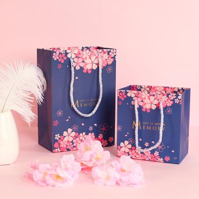 China Recyclable Flower Printing Shopping Bags With Logos Wedding Custom Paper Bag With Ribbon for sale