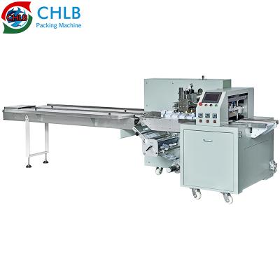 China Food Almond Butter 4 Side Seal Packing Machine Price Soap Flow Packing Machine Price With Bottom Film for sale