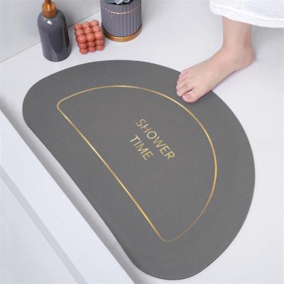 China Viable Rectangle Semicircular Mat Water Absorbent Quick Drying Floor Mat Skin Non Slip Diatomite Oval Bath Mat for sale