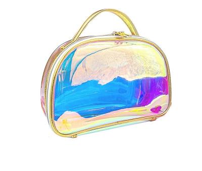 China Laser rainbow PVC Cosmetic toiletry bag Transparent Travel Cosmetic Bag With Logo handle for sale