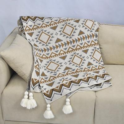 China Plain New Arrival Boho Waffle Hotel Office Blanket Throw Blanket Bohemian Ready Knit Acrylic Knitted Blanket Tassel For Sofa for sale