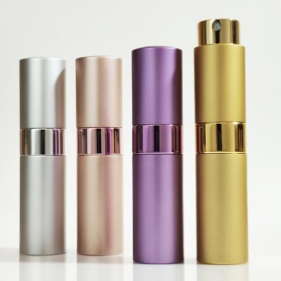 China 8ml 5ml 20ml Cosmetic Wholesale Empty Portable Fine Mist Twist Up Refillable Matte Black 15ml Perfume Atomizer Bottle for sale