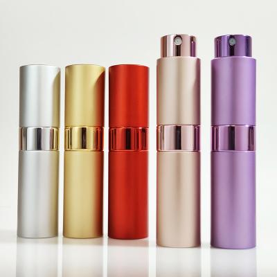 China Cosmetic Empty Round Travel Customize 20ml Twist Perfume Aluminum Atomizer Refillable Spray Bottle for sale