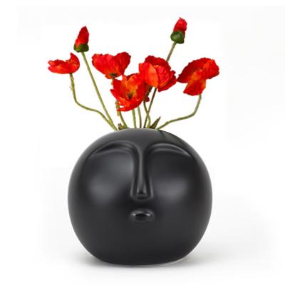 China Contemporary Human Head Black Body Ceramic Flower Vase for sale