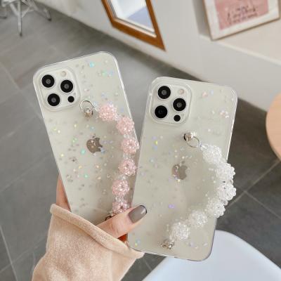 China Luxury Anti-fall Pearl Holder Chain With Strap Transparent Glitter Phone Case For Apple Iphone 12 Max Case Of 11 pro 12pro Wrist Bands for sale