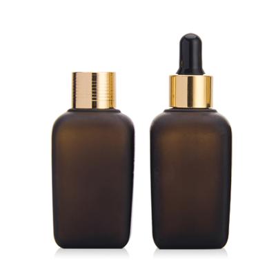 China Cosmetic Eye Oils Bottles 50ml Essential Oil Bottle Glass Essential Amber Bottle for sale