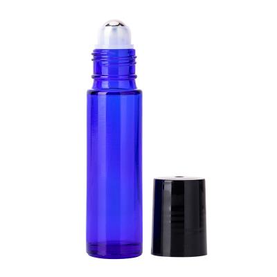 China 2021 popular cosmetics between Europe oil perfume bottle for cobalt blue essential oil glass bottle cosmetic bottles perfume glass bottle for sale