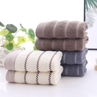 China Adult thickened water absorption bath towel men and women household face wash towel hypoallergenic cotton towel wholesale for sale