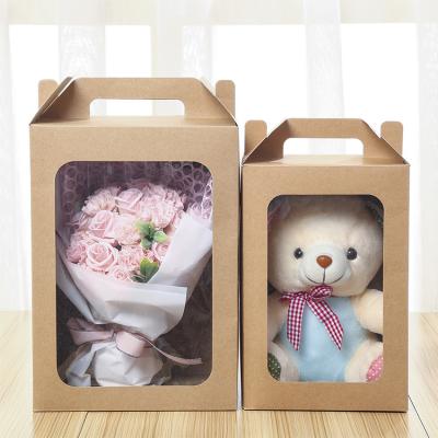 China Luxury Recycled Materials Folding Gift Boxes Packaging Kraft Paper Boxes With Clear Window Front Paper Shopping Box for sale