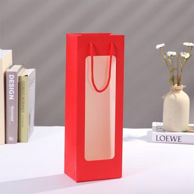 China Small Recycled Materials Custom Packaging Bags For Clothing Clear Sachet Packaging Plastic Wine Gift Bags for sale