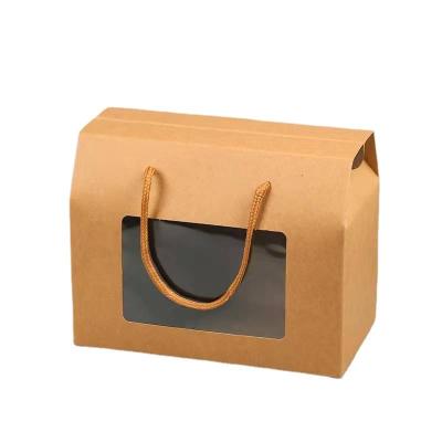 China Recycled Materials Wholesale Eco-friendly Cookie Nuts Packaging Box With Hand Rope Window Folding Paper Box for sale