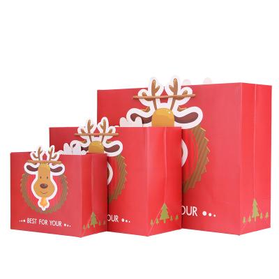 China Recyclable Christmas Gift Bags With Matching Prints For Kraft Holiday Paper Candy Bags Christmas Gift Bags for sale