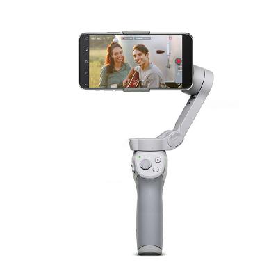 China DJI OM 4 foldable phone gimbal osmo mobile 4 with a magnetic ring holder intelligent functions providing stable en venta