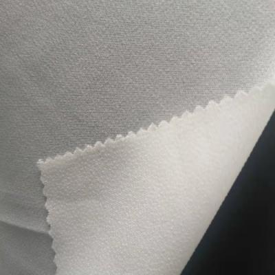 China Fusible Soft Polyester 50D Double Handfeeling Dot Plain Weave Adhesive Interlinings , Interlining Fabric for sale