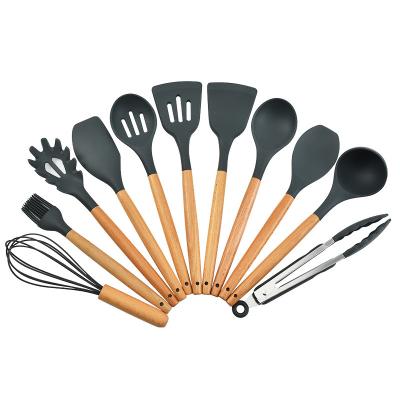 China Viable 11 Pieces In 1 Set Silicone Kitchen Accessories Cooking Tools Kitchen Tableware Cocina Silicone Cookware With Wooden Handles for sale