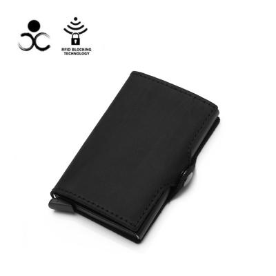 China New high quality luxury genuine leather rfid OEM automobile noise protect business card holder metal front pocket wallet for travel for sale