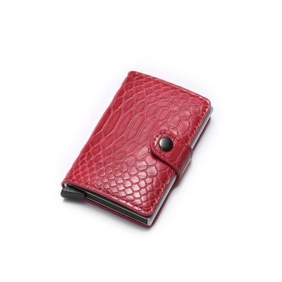 China RFID Blocking Protects 2020 New Fashion Python Pattern Top Grade Minimalist Metal RFID Blocking Anti Theft Slim Wallet Smart Leather Card Holder for sale