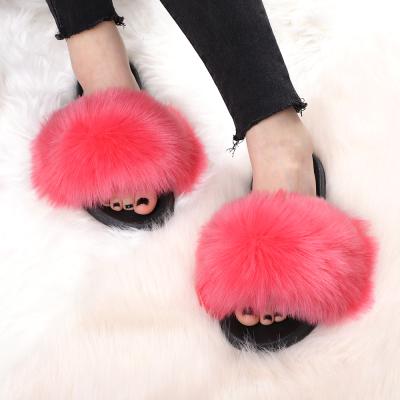 China Women's Fashion Brand Soft Slippers Women's Fashion Brand Fur Slippers Sandals Natural Color Fur Slides for sale