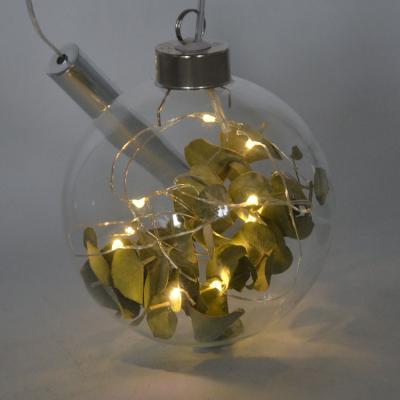 China Europe LED Lights Clear Glass Ball With Green Leaves For Christmas Decoration for sale