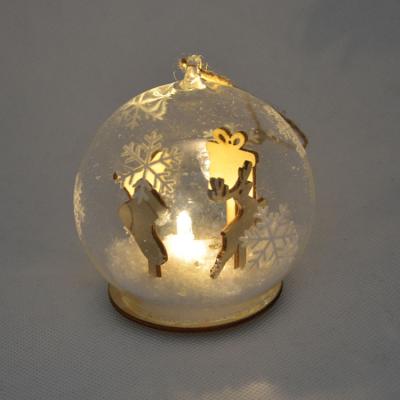 China Christmas Decoration Or Gift Led Light Glass Snow Ball With Wooden Christmas Ornament for sale