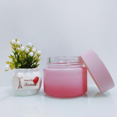 China Cosmetic Blue Pink Glass Jar For Cosmetic Cream Package White Glass Material With ABS Cap for sale