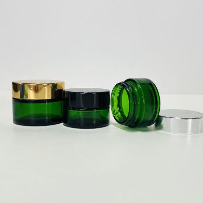 China Factory Wholesale Custom Glass Cosmetic Jars Cosmetic Container Blue Green UV Cream Glass Jar for sale