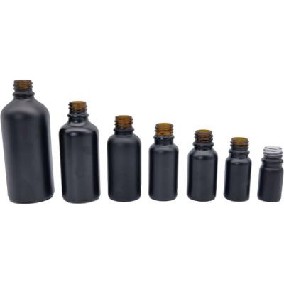 China Cosmetic Eco-Friendly Black Matte Essential Oil Packaging Prefume Sprayer Glass Bottles With Spray Mist Cap for sale