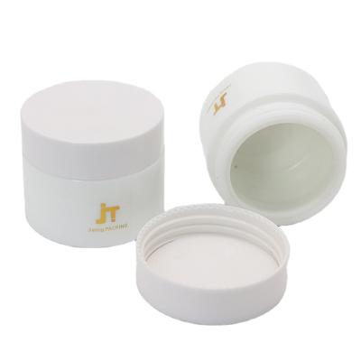 China 2oz Porcelain Cosmetic White Cosmetic Slanted Shoulder Jar With Dome Caps for sale