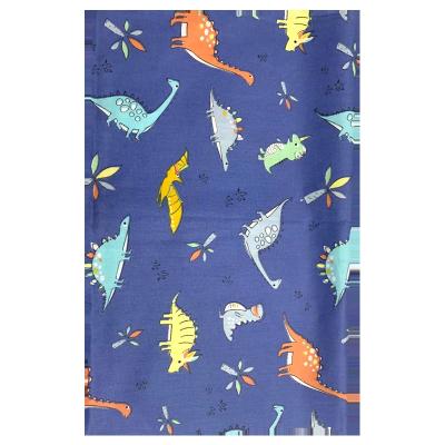 China Anti Static Dinosaur Animal Designs 100% Cotton Printed Fabric Yard Dyed Fabrics For Kids for sale