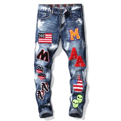 China Retro Breathable Blue Skinny Jeans Tapered Embroidery Patchwork Jeans Pants Casual Streetwear Jeans Men for sale