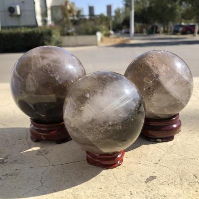 China Wholesale Sellable Polished Natural Europe Smoky Quartz Crystal Ball Spheres For Home Decoration for sale