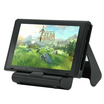 China Adjustable Foldable Handheld Game Console Charging Dock for Nintendo Switch lite Stand for sale