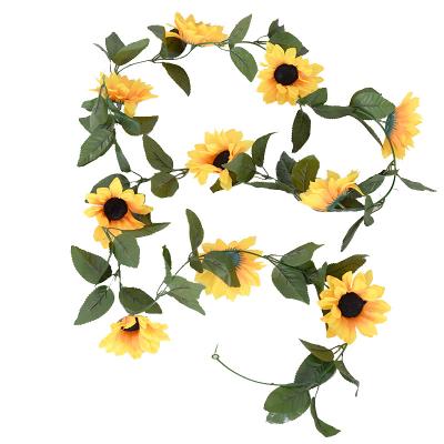 China Minimalist Artificial Flower Vine Shop Window Display Sunflower Green Leaves Backdrop Rattan Flower Decor for sale