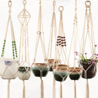 China Dropshipping Cotton Macrame Traditional Handmade Plant Hanger Indoor and Outdoor Plant Home Decoration for sale