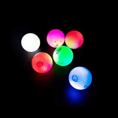 China Plastic Night Glowing Golf Balls Lights Rechargeable Fluorescent Golf Ball In 2021 for sale